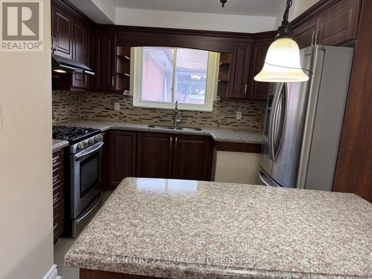 15 Vange Crescent, Toronto, ON - Indoor Photo Showing Kitchen With Double Sink
