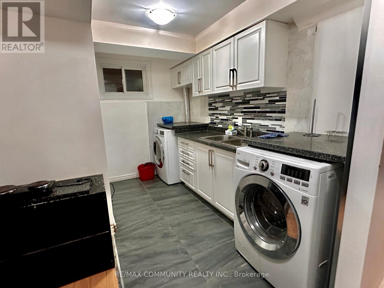 Bsmt - 54 Emcarr Drive, Toronto, ON - Indoor Photo Showing Laundry Room