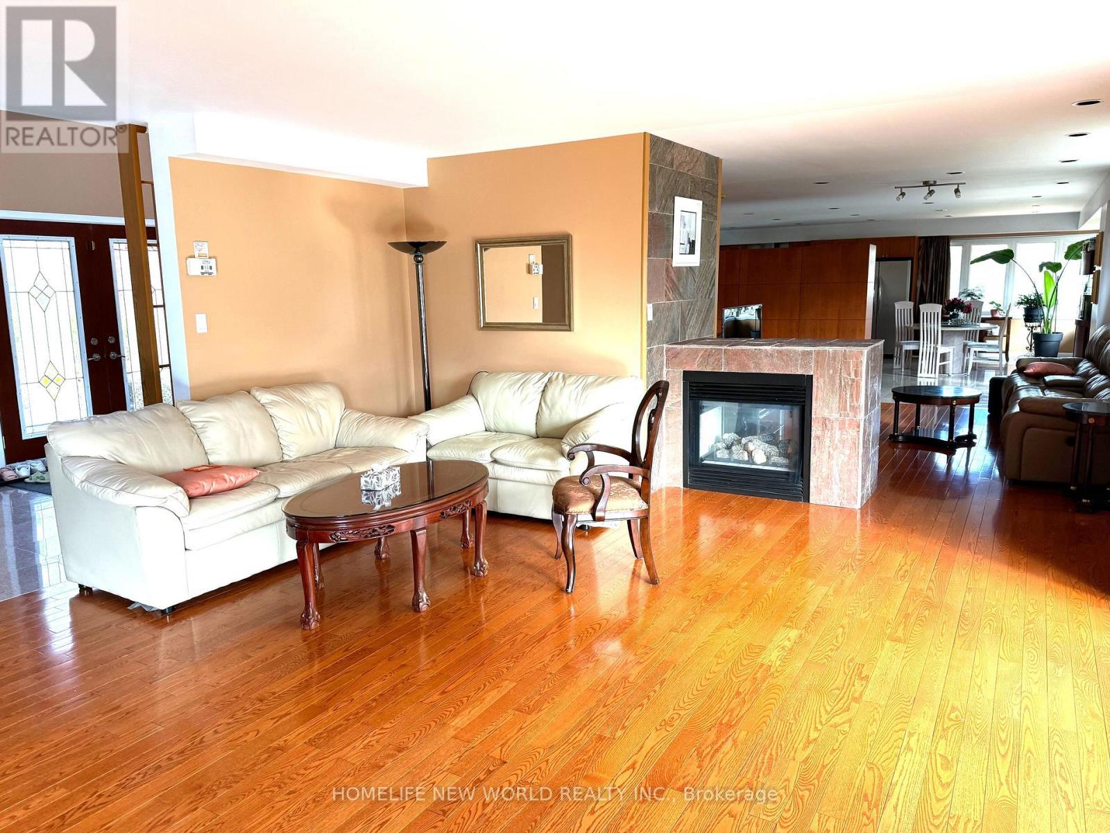 13867 Woodbine Avenue, Whitchurch-Stouffville, ON - Indoor Photo Showing Living Room With Fireplace