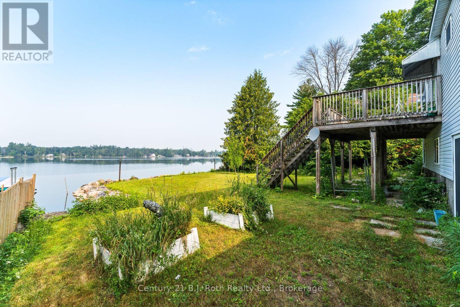 3338 Cox Drive, Severn, ON - Outdoor With Body Of Water