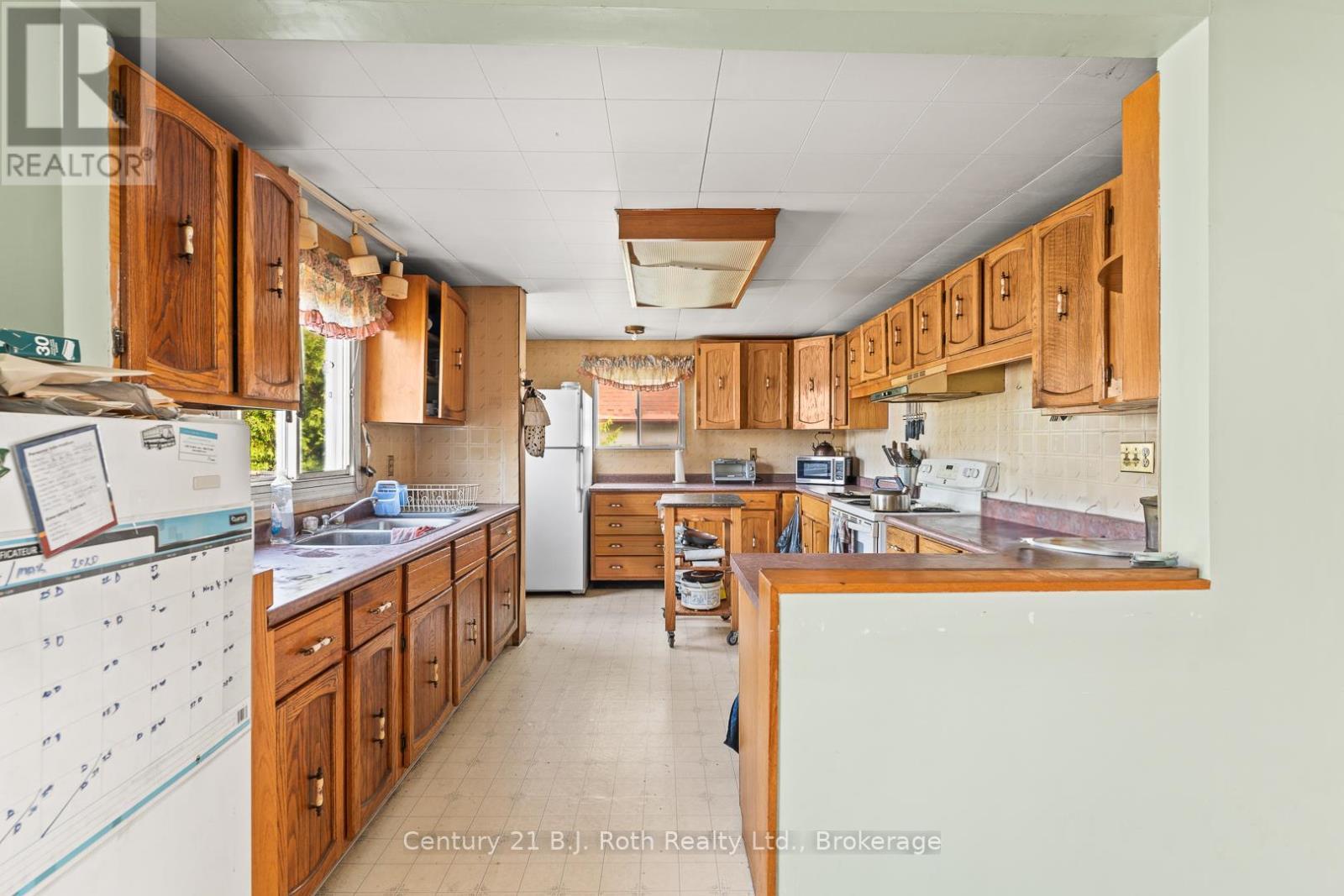 3338 Cox Drive, Severn, ON - Indoor Photo Showing Kitchen With Double Sink