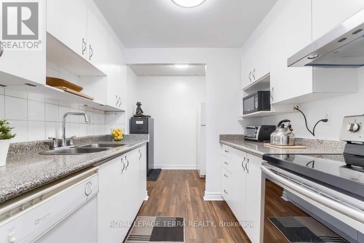 1207 - 4 Lisa Street, Brampton, ON - Indoor Photo Showing Kitchen With Double Sink