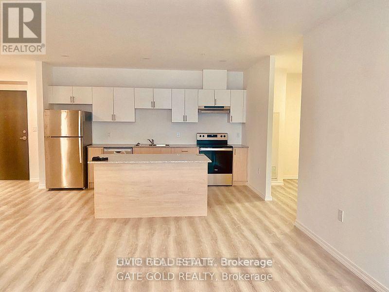 513 - 1098 Paisley Road W, Guelph, ON - Indoor Photo Showing Kitchen With Stainless Steel Kitchen With Double Sink
