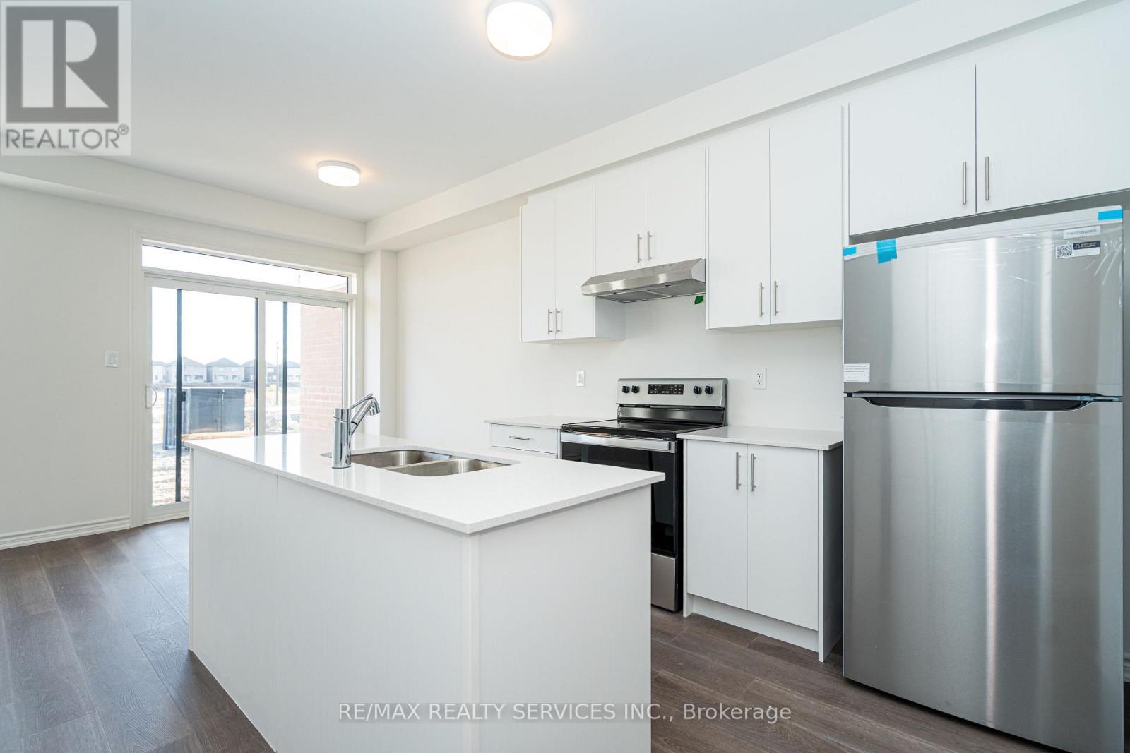 123 Sanderson Drive, Kawartha Lakes, ON - Indoor Photo Showing Kitchen With Stainless Steel Kitchen With Double Sink