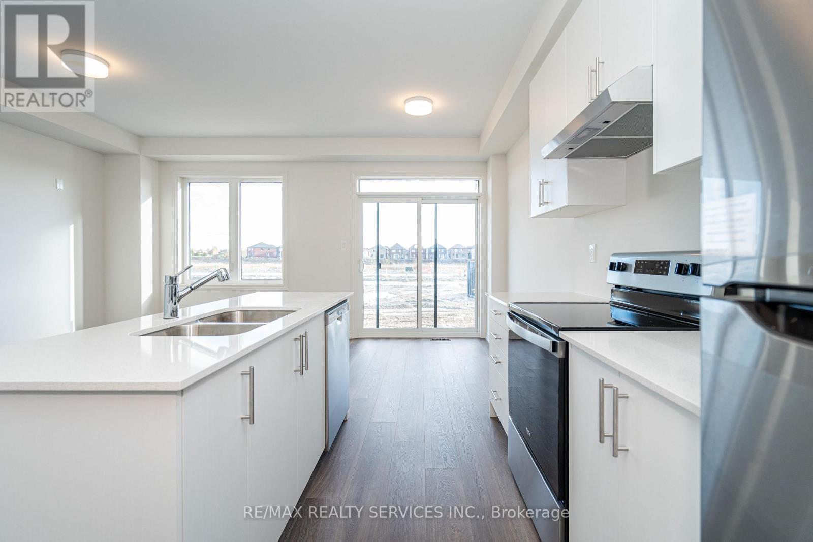 123 Sanderson Drive, Kawartha Lakes, ON - Indoor Photo Showing Kitchen With Double Sink