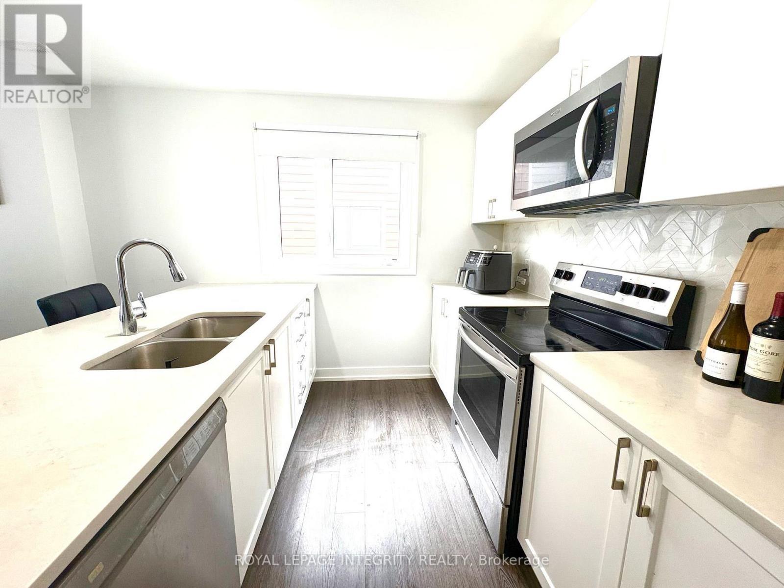129 - 258 Anyolite Private, Ottawa, ON - Indoor Photo Showing Kitchen With Double Sink