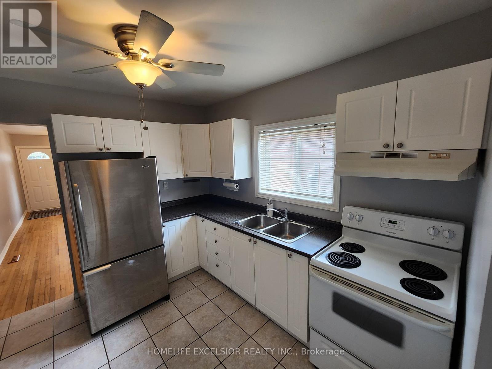 16 Sixteenth Street, Toronto, ON - Indoor Photo Showing Kitchen With Double Sink