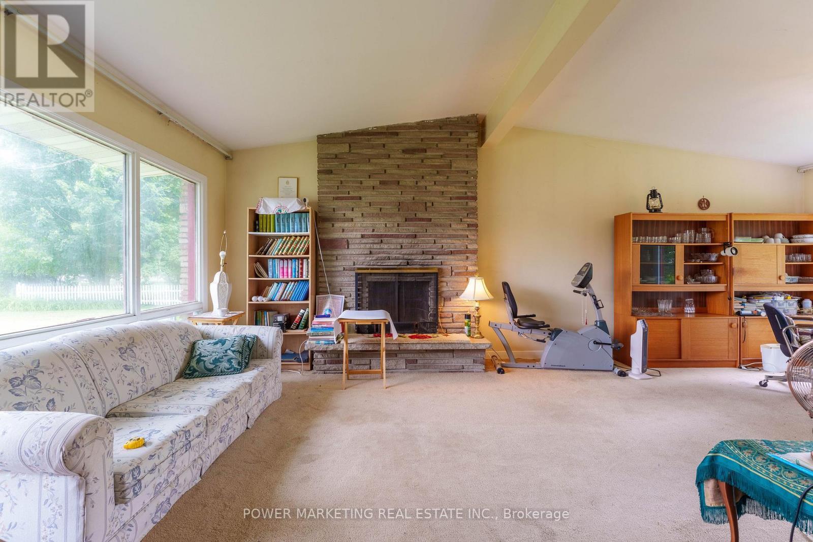 5329 Bank Street, Ottawa, ON - Indoor Photo Showing Living Room With Fireplace