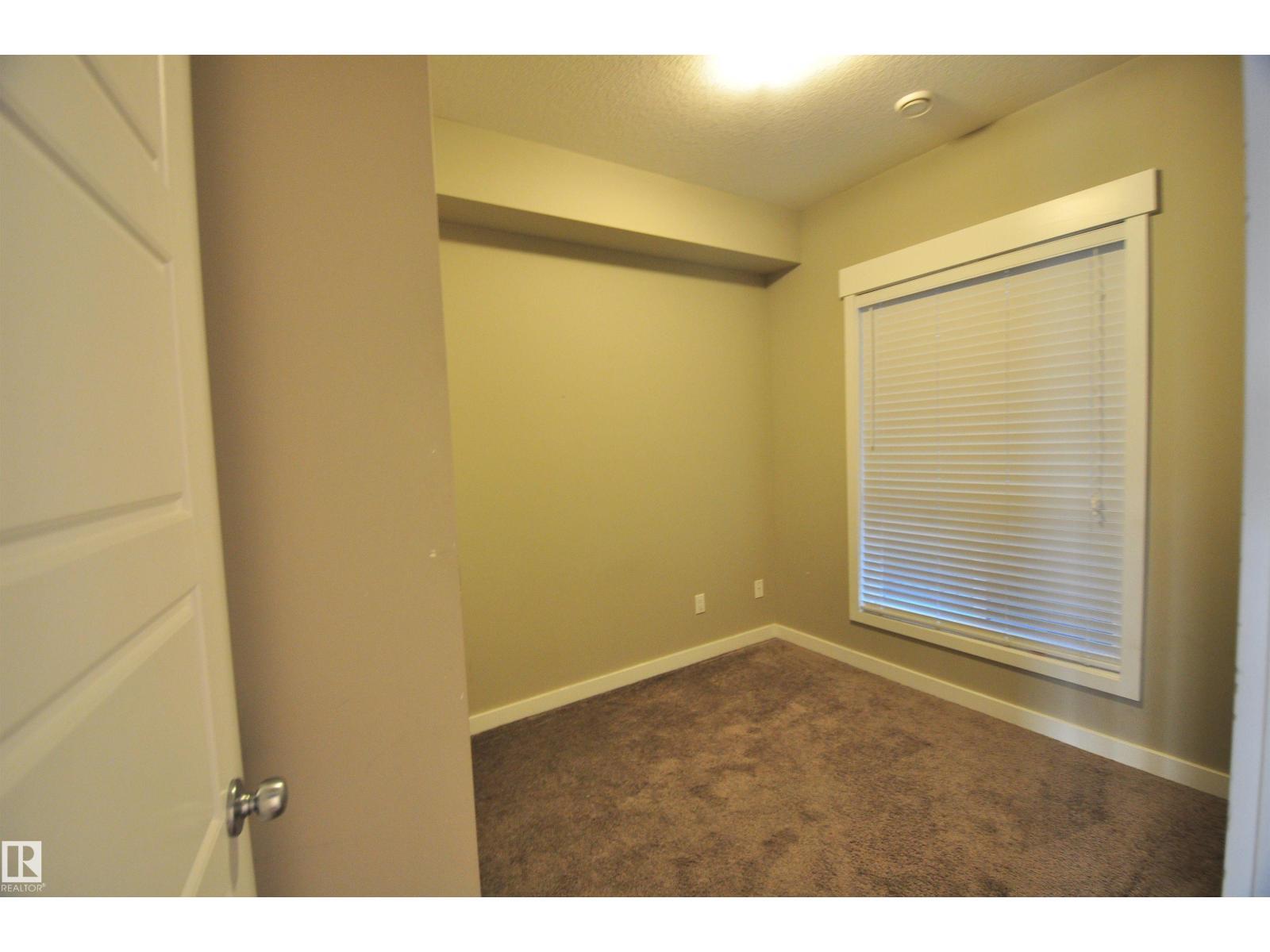 #407 10518 113 St Nw, Edmonton, AB - Indoor Photo Showing Other Room