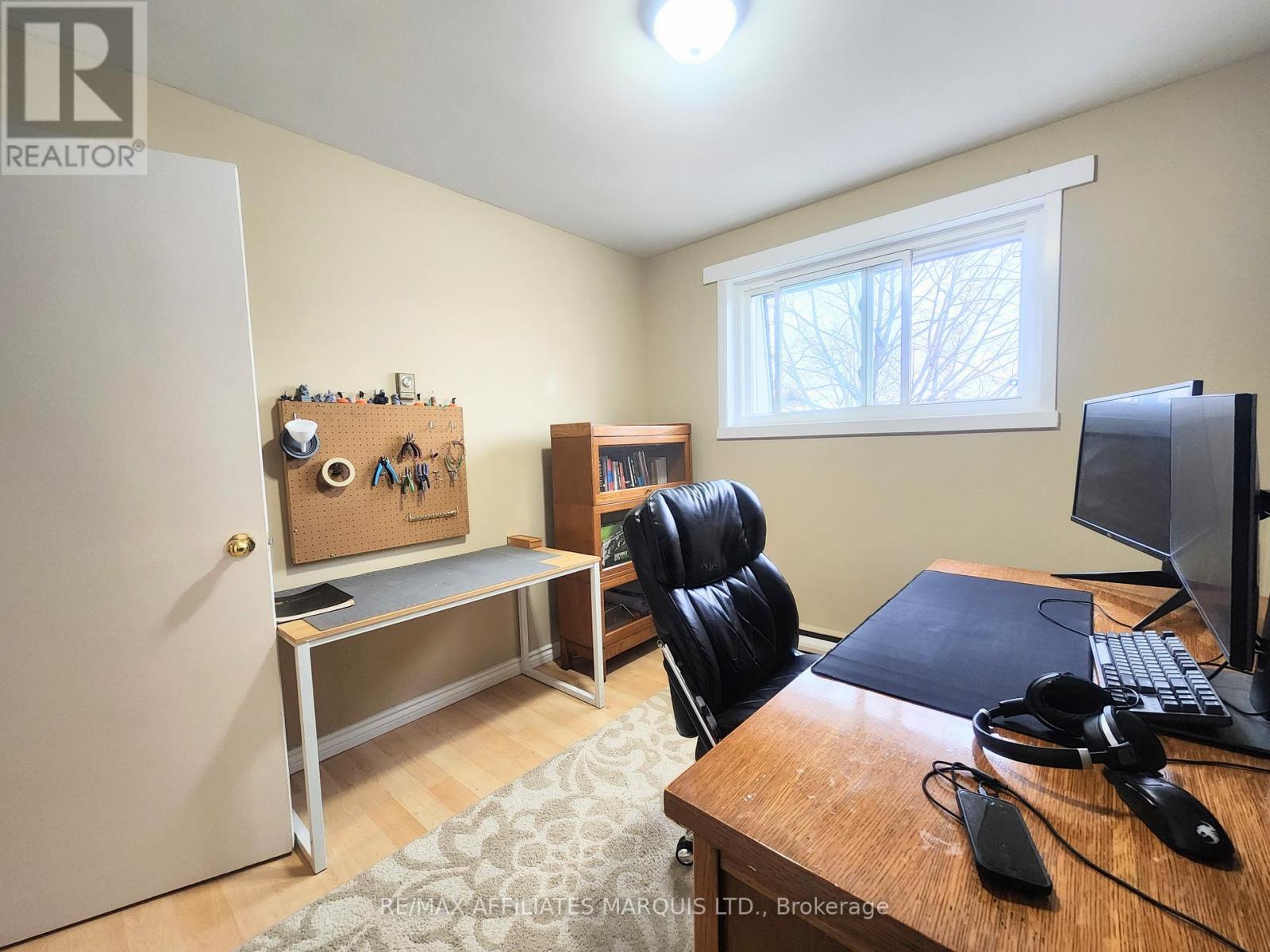 Bedroom 2 with large closet - 409 - 845 Kyle Court, Brockville, ON - Indoor Photo Showing Office