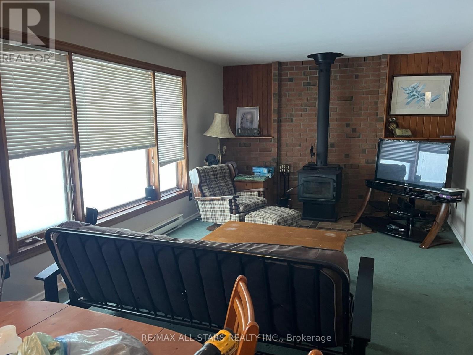 268 Pringles Road, South Algonquin, ON - Indoor With Fireplace