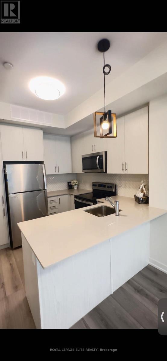 7 - 3546 Colonial Drive, Mississauga, ON - Indoor Photo Showing Kitchen With Double Sink