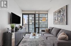 Livingroom w/ Walkout to Balcony -