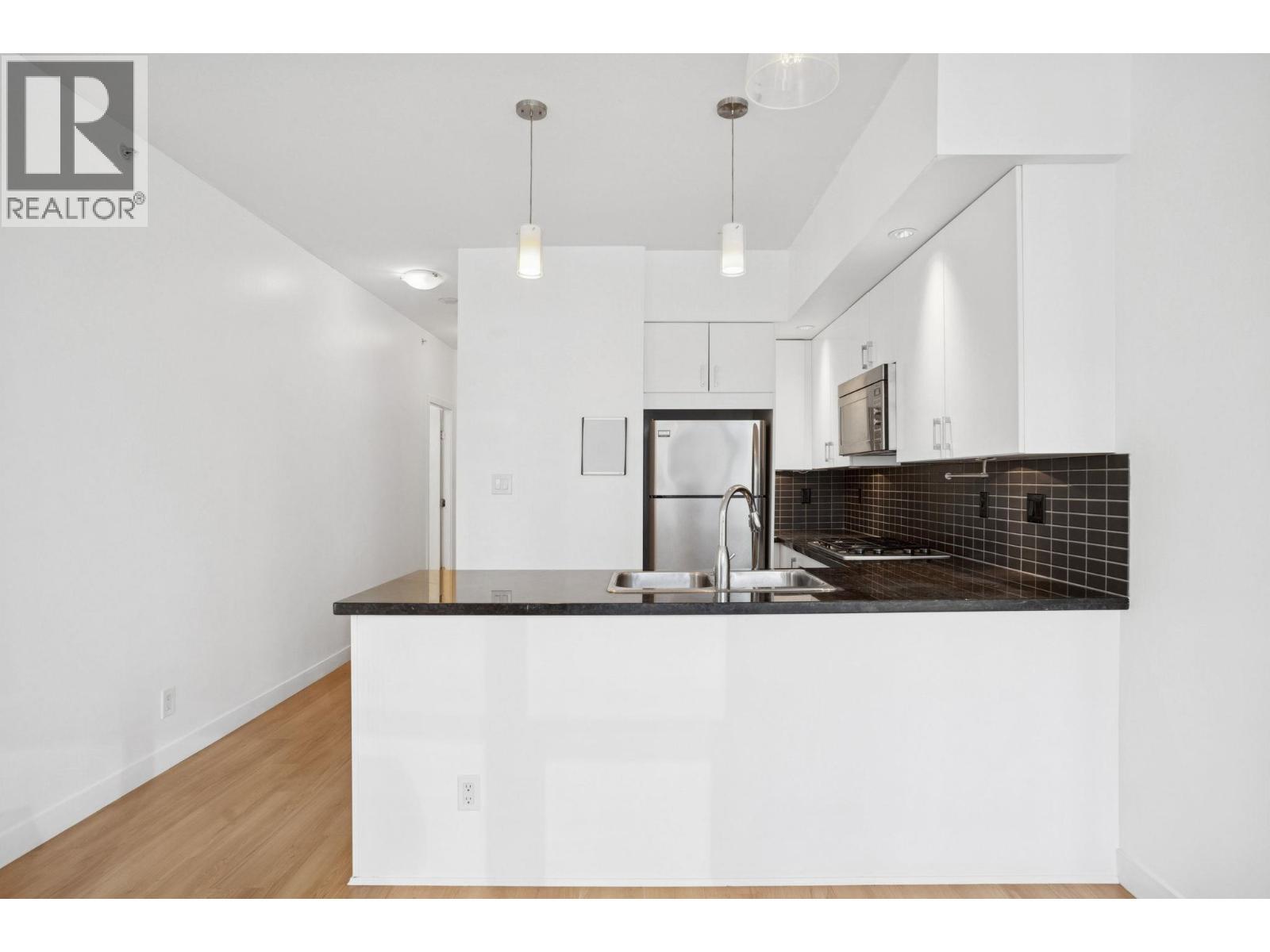 1203 1050 Smithe Street, Vancouver, BC - Indoor Photo Showing Kitchen With Double Sink