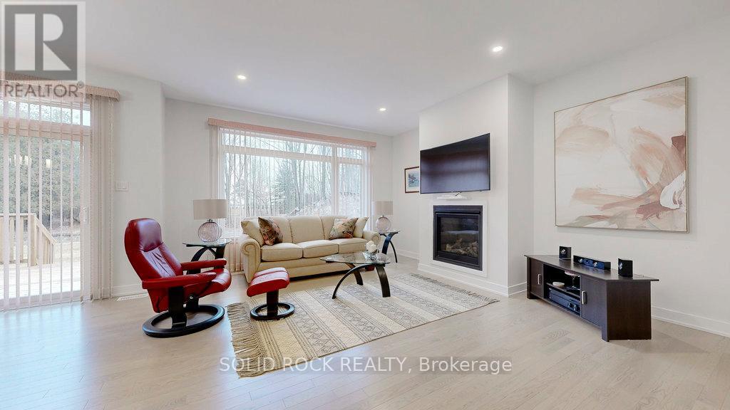 301 Wood Avenue, Smiths Falls, ON - Indoor Photo Showing Living Room With Fireplace