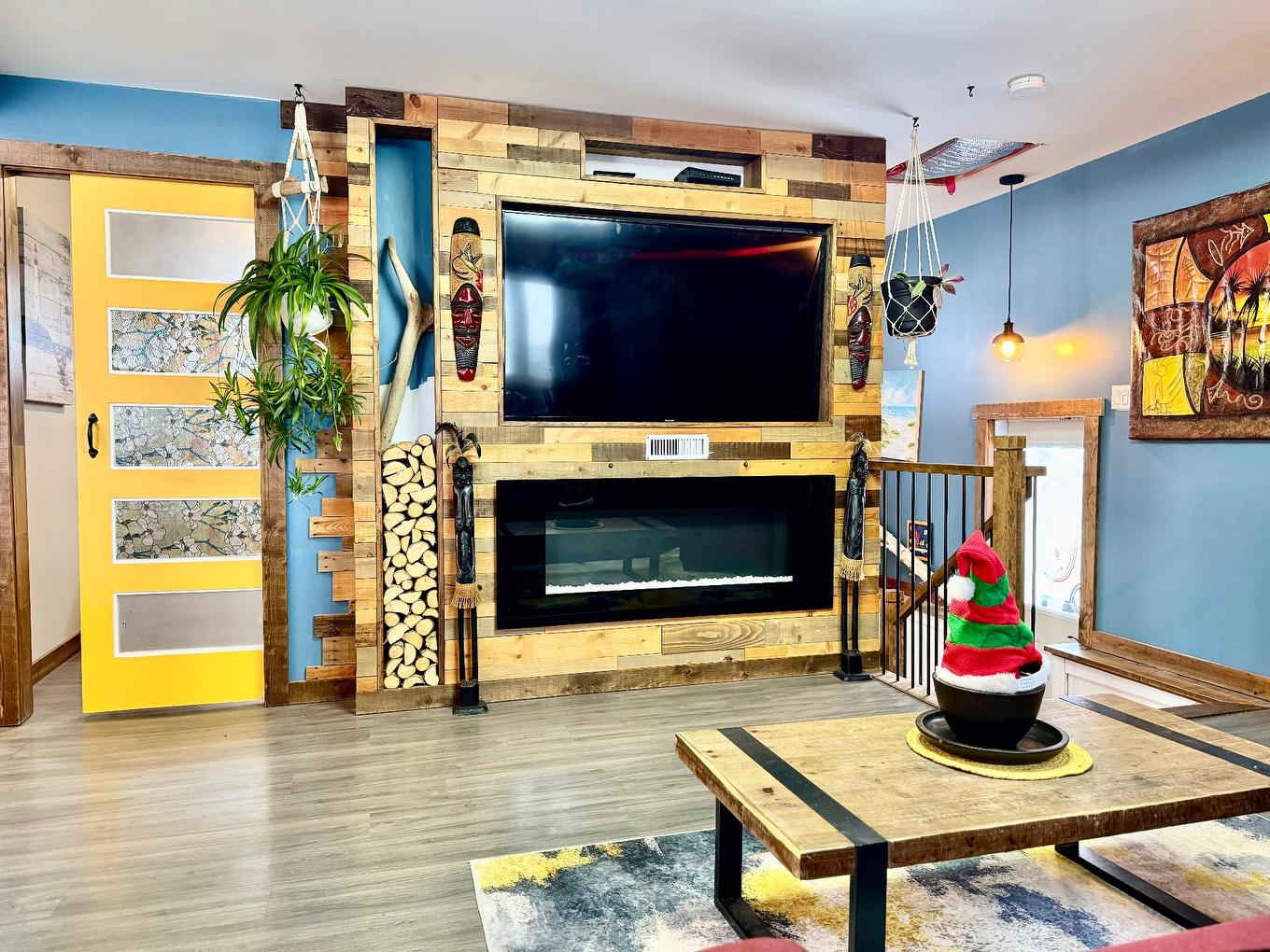 Salon - 3 Ch. Lapierre, Les Îles-De-La-Madeleine, QC - Indoor Photo Showing Other Room With Fireplace