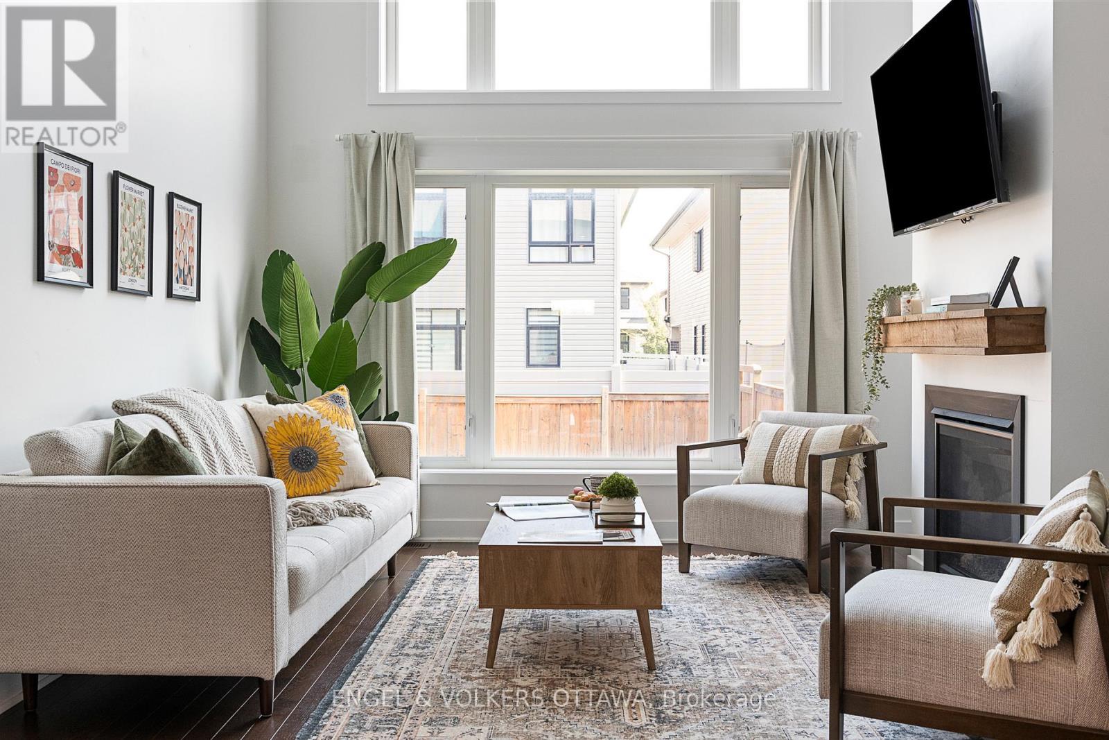 430 Markdale Terrace, Ottawa, ON - Indoor Photo Showing Living Room With Fireplace
