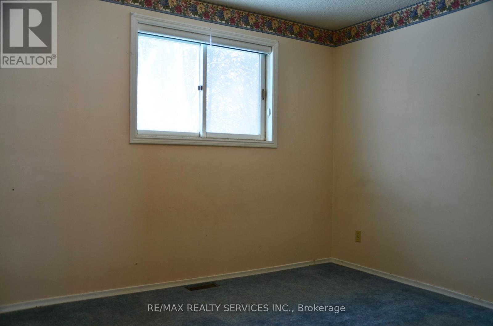 Bedroom - 1045 Tremaine Avenue S, North Perth, ON - Indoor Photo Showing Other Room