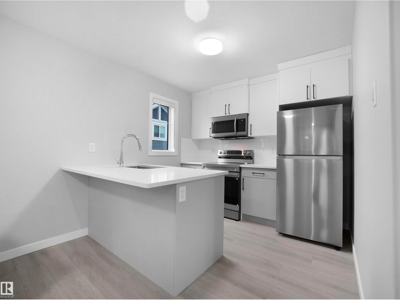 3331 Roy Brown Wy Nw, Edmonton, AB - Indoor Photo Showing Kitchen With Upgraded Kitchen