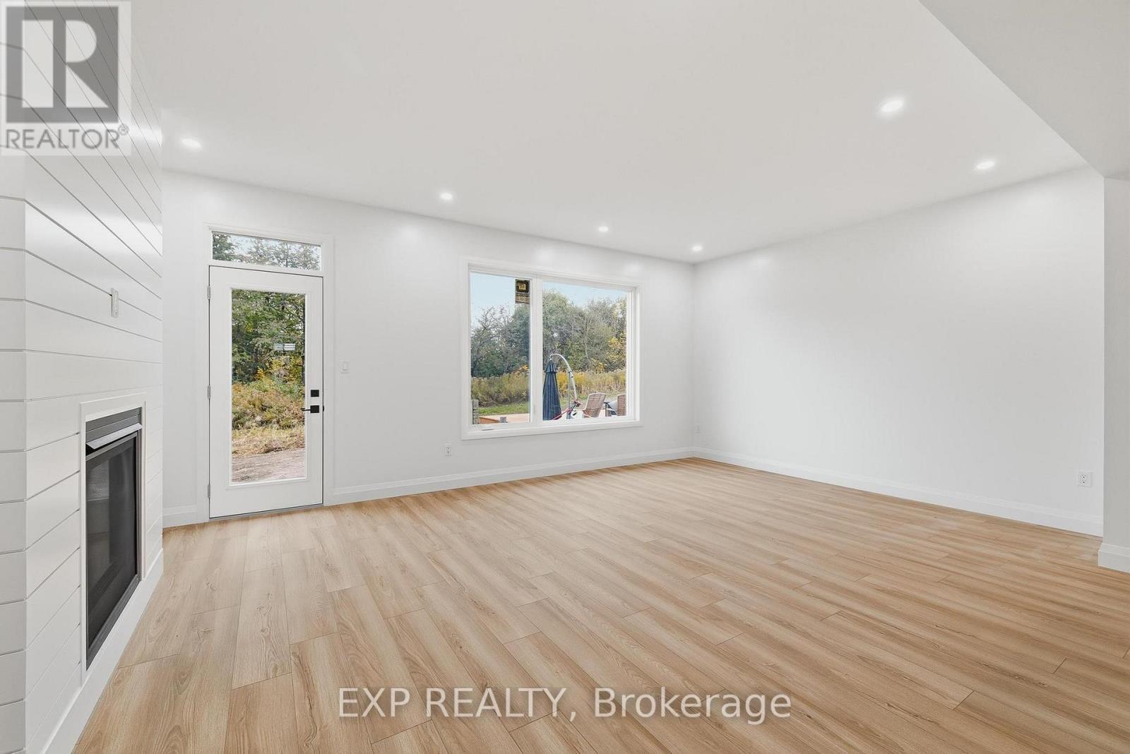 133 Pugh Street, Perth East, ON - Indoor With Fireplace