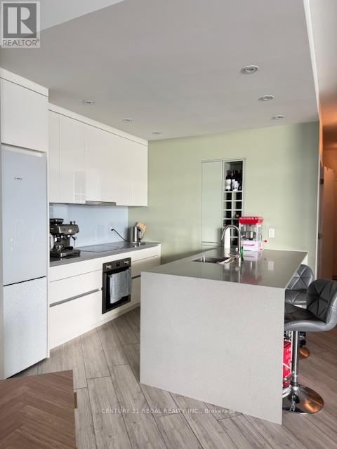 2509 - 208 Queens Quay W, Toronto, ON - Indoor Photo Showing Kitchen With Double Sink