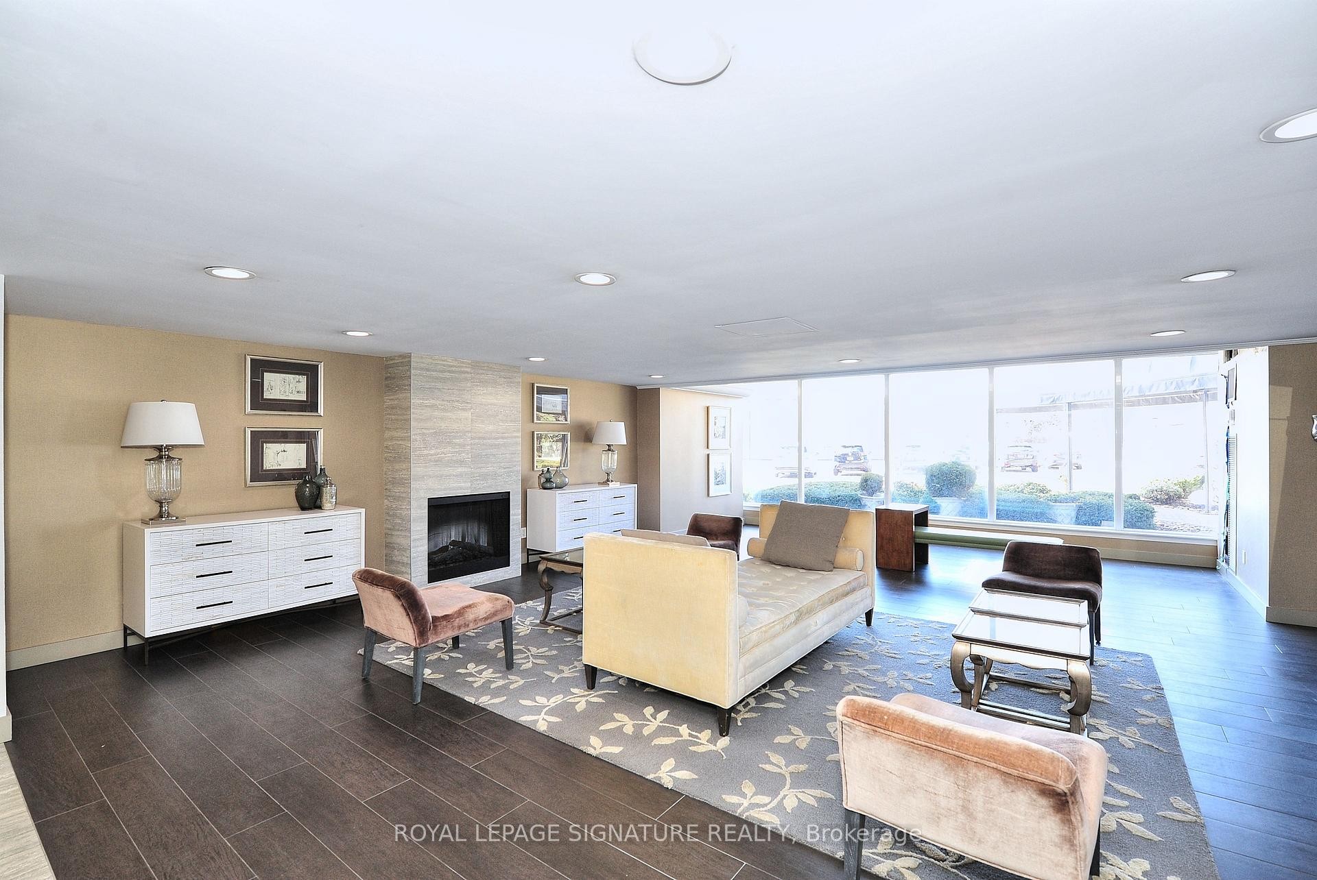 1208-7811 Yonge Street, Markham, ON - Indoor Photo Showing Living Room With Fireplace