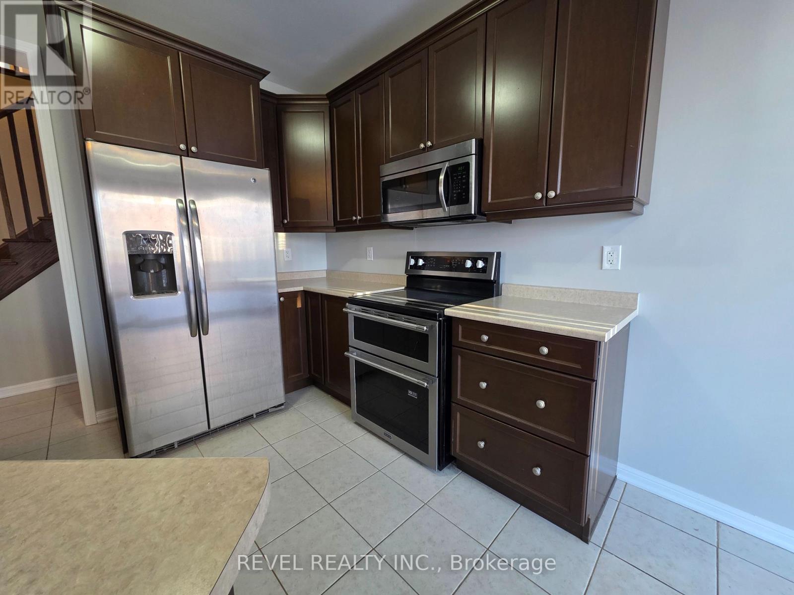 1127 Savoline Boulevard, Milton, ON - Indoor Photo Showing Kitchen With Stainless Steel Kitchen