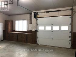 25'x25'+2'x10' garage with 11' cathedral ceiling. -