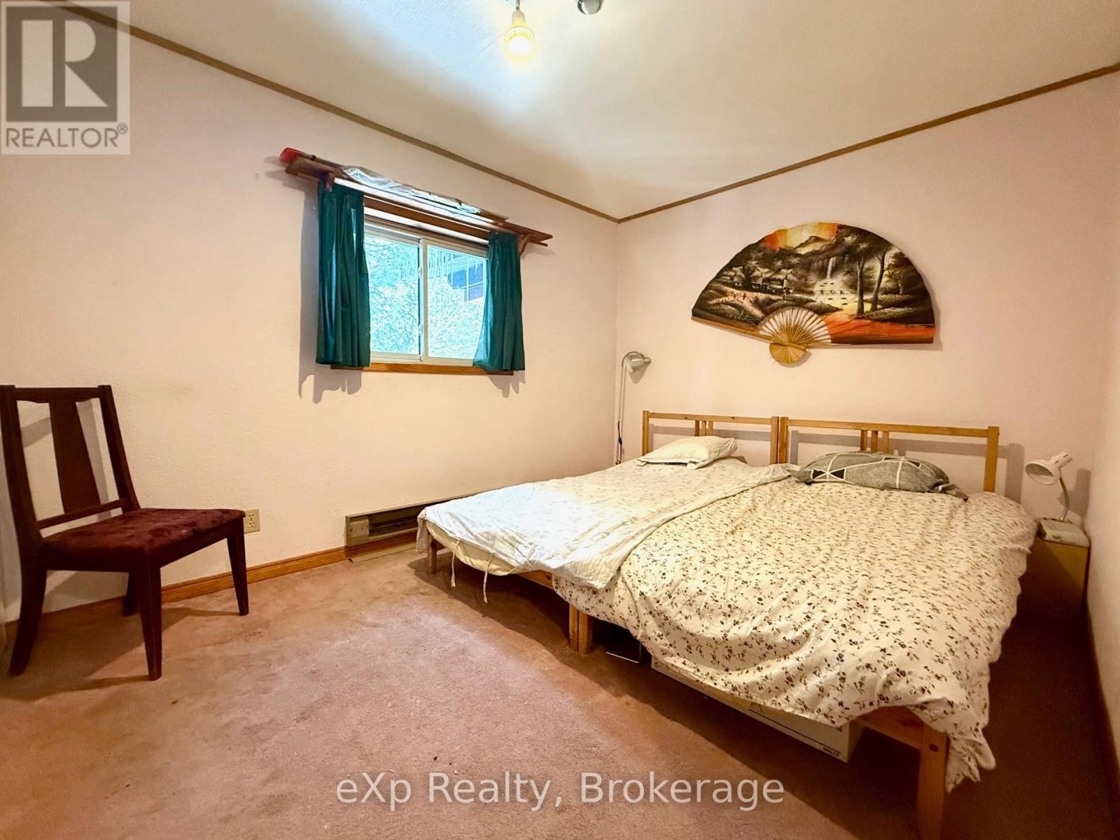 173266 Mulock Road, West Grey, ON - Indoor Photo Showing Bedroom