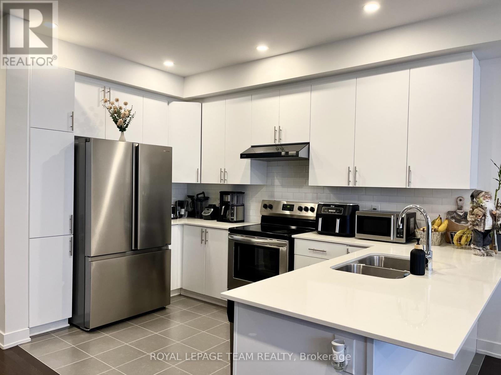 57 Heirloom Street, Ottawa, ON - Indoor Photo Showing Kitchen With Stainless Steel Kitchen With Double Sink