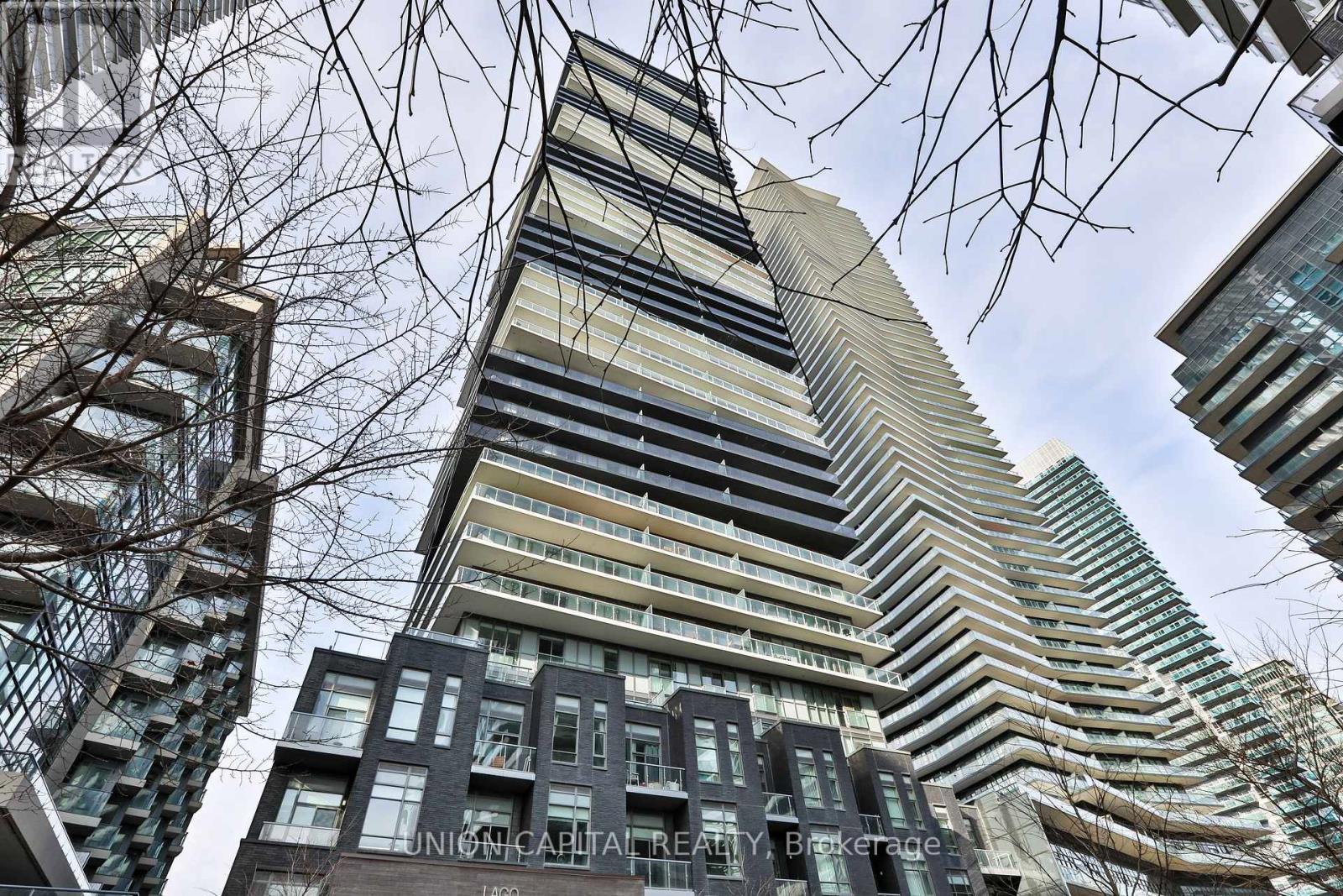 305 - 56 Annie Craig Drive, Toronto, ON - Outdoor With Balcony With Facade