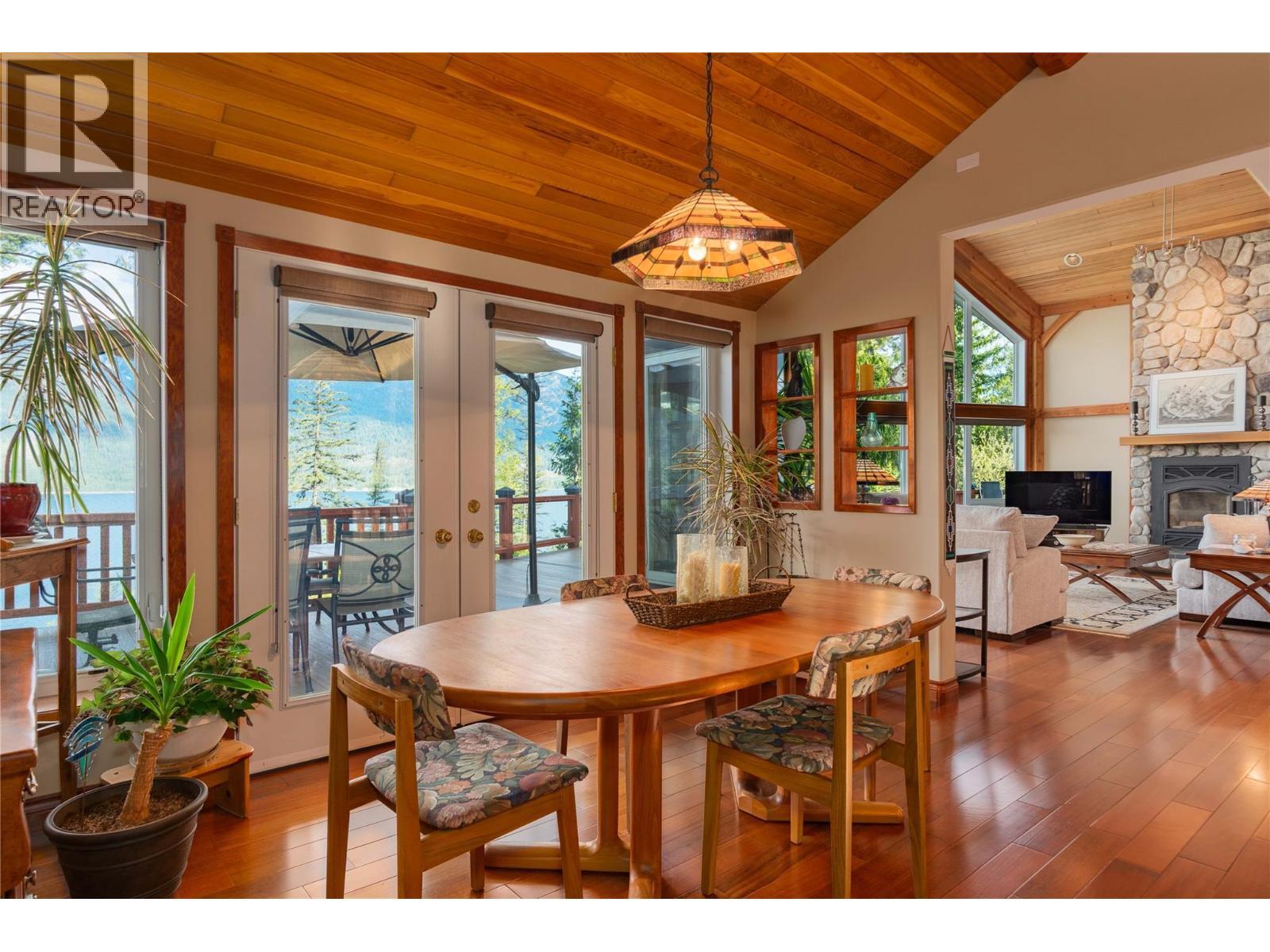 4830 Fletcher Creek Road, Fletcher Creek, BC - Indoor Photo Showing Dining Room With Fireplace