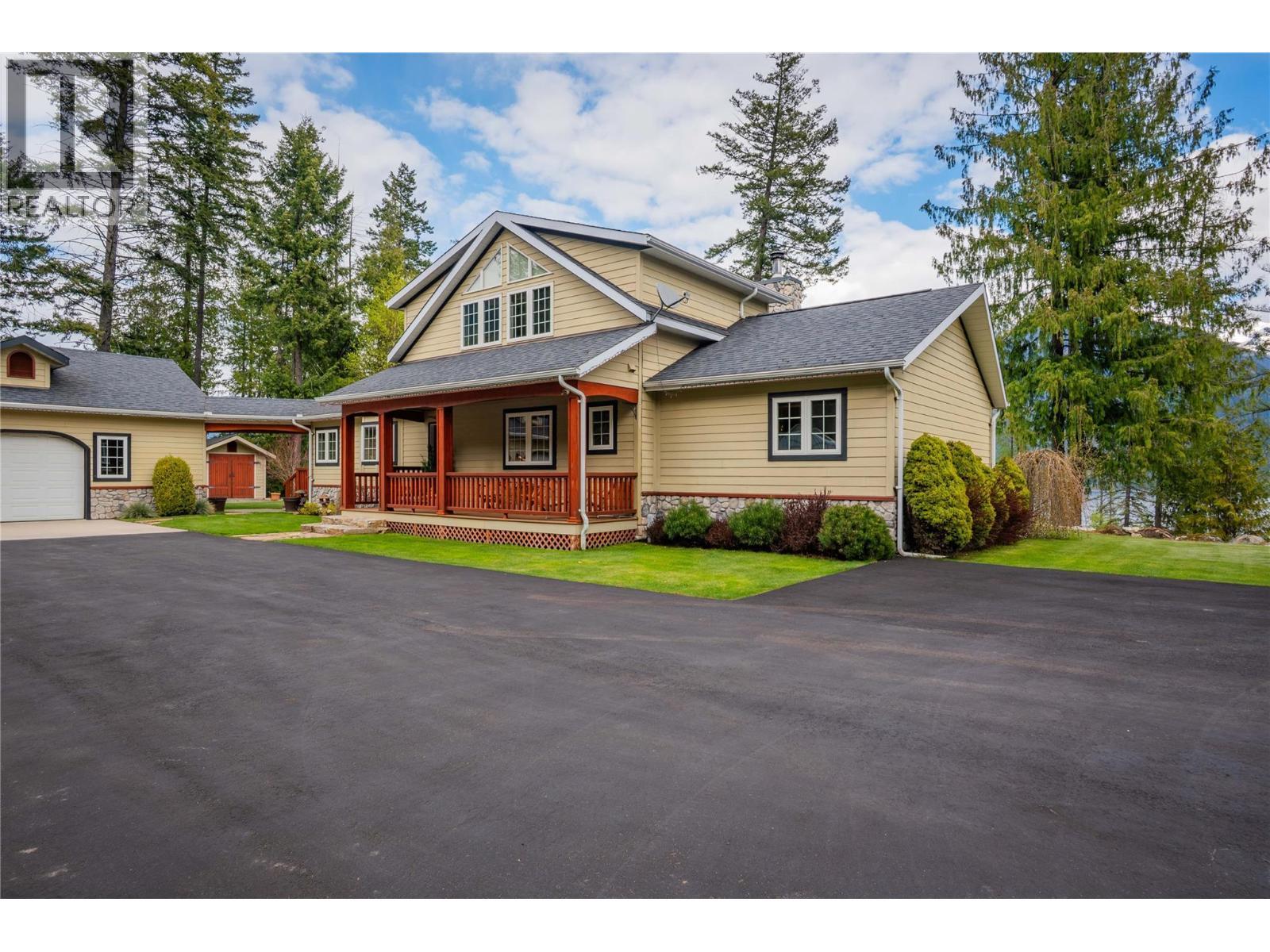 4830 Fletcher Creek Road, Fletcher Creek, BC - Outdoor With Deck Patio Veranda With Facade