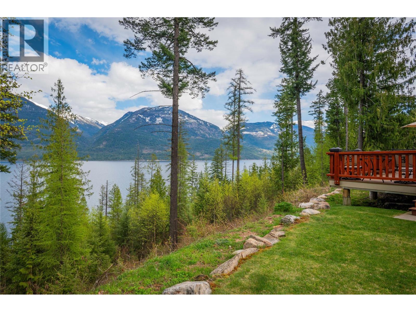 4830 Fletcher Creek Road, Fletcher Creek, BC - Outdoor With Body Of Water With Deck Patio Veranda With View