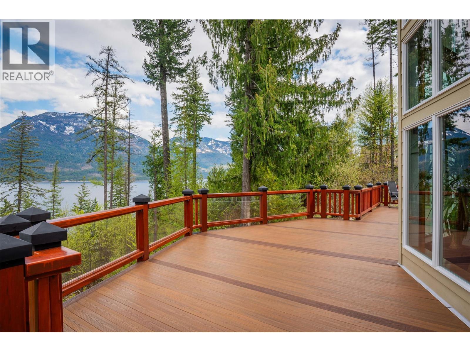 4830 Fletcher Creek Road, Fletcher Creek, BC - Outdoor With Body Of Water With Deck Patio Veranda