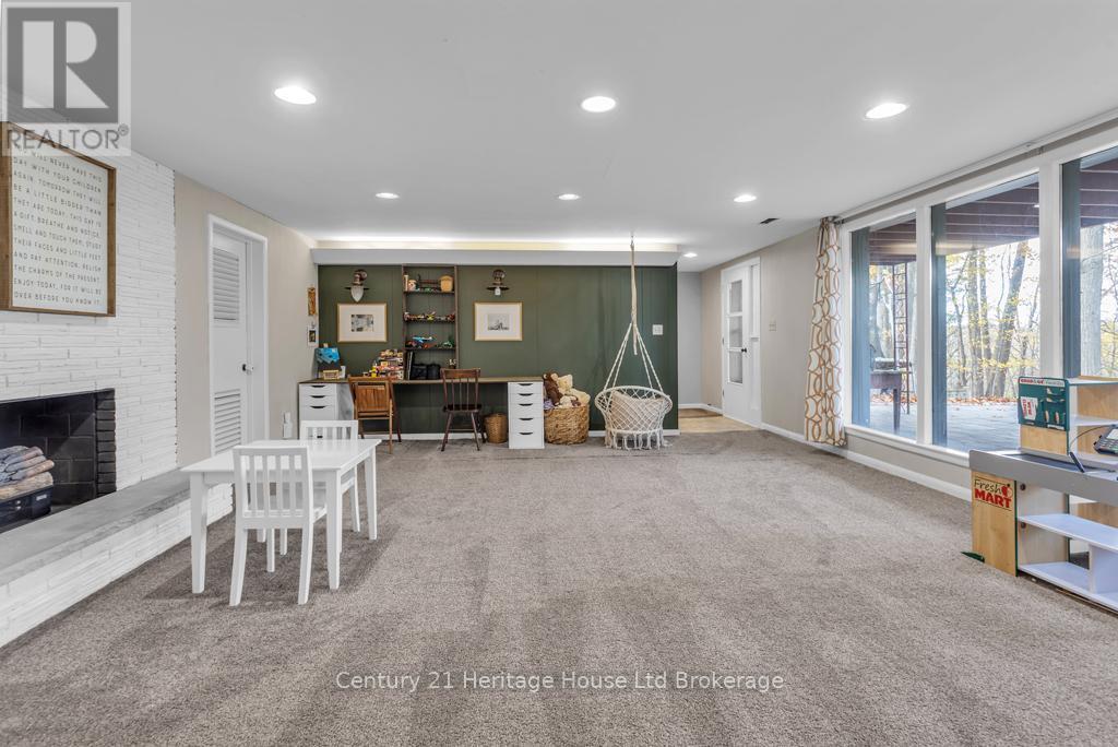 Lower level rec room with walk out - 1 Highland Drive, Tillsonburg, ON - Indoor With Fireplace