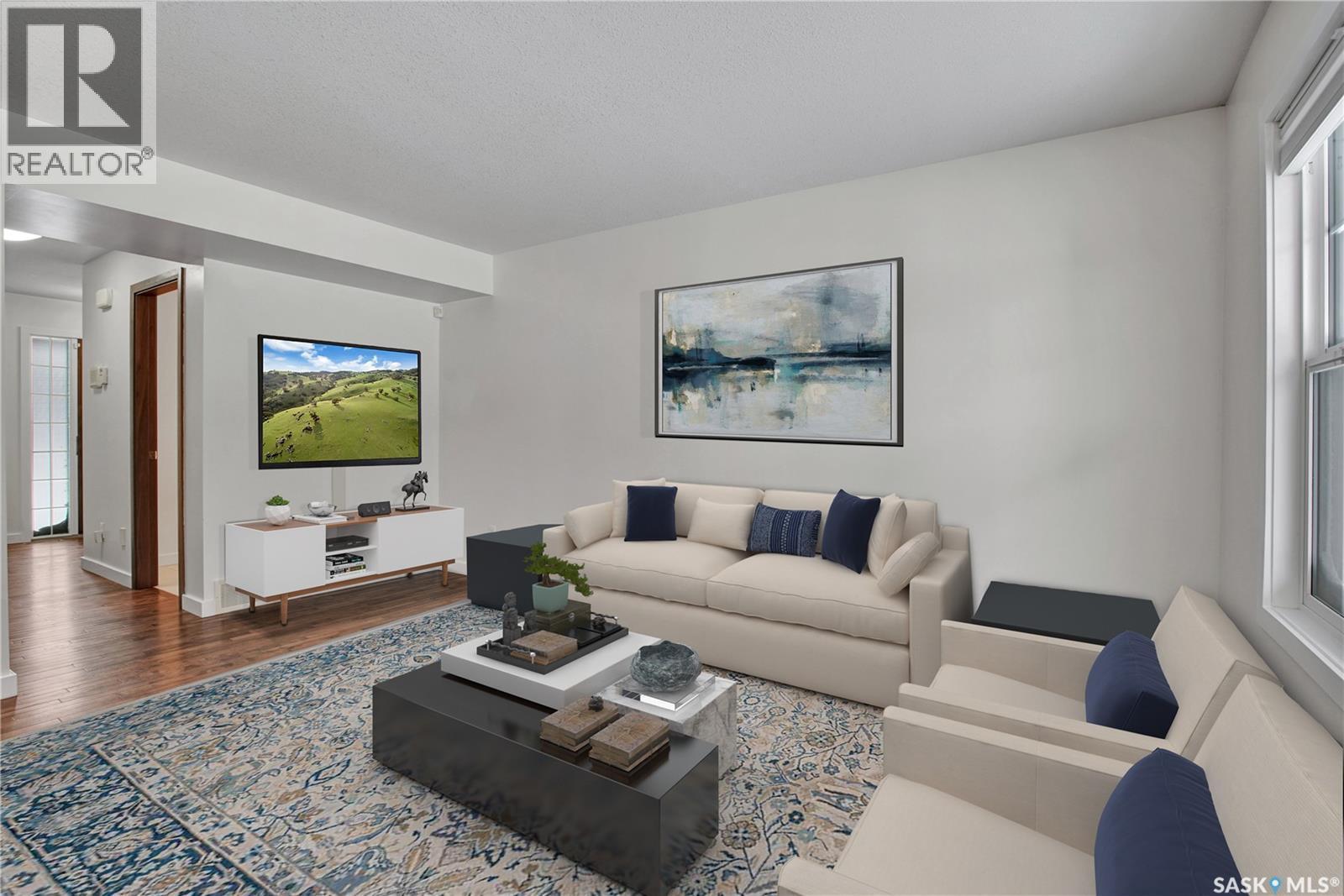 607 1303 Paton Crescent, Saskatoon, SK - Indoor Photo Showing Living Room