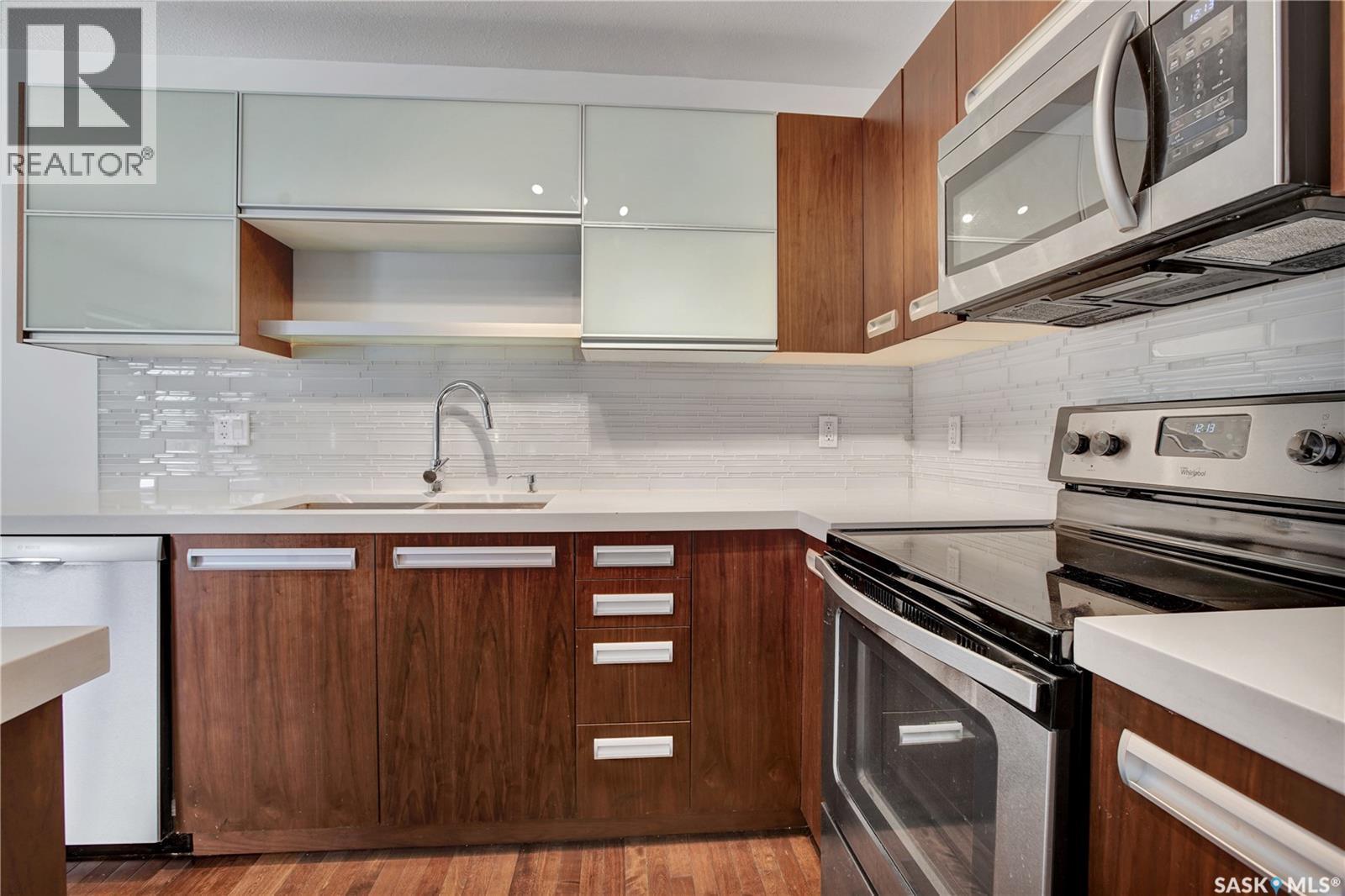 607 1303 Paton Crescent, Saskatoon, SK - Indoor Photo Showing Kitchen With Double Sink With Upgraded Kitchen