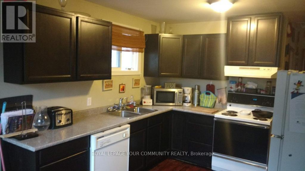 381 The Queensway Street S, Georgina, ON - Indoor Photo Showing Kitchen With Double Sink