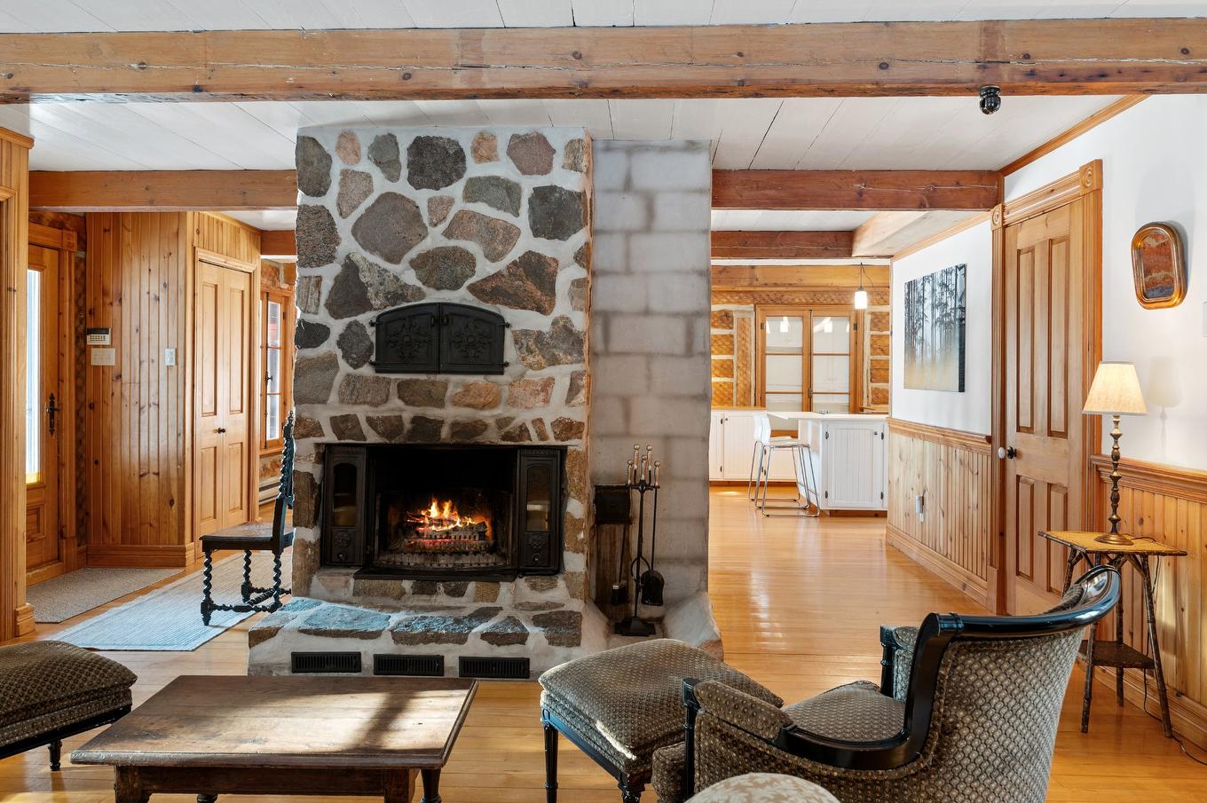 Living room - 1735 - 1737 Ch. De La Gare, Val-Morin, QC - Indoor Photo Showing Living Room With Fireplace