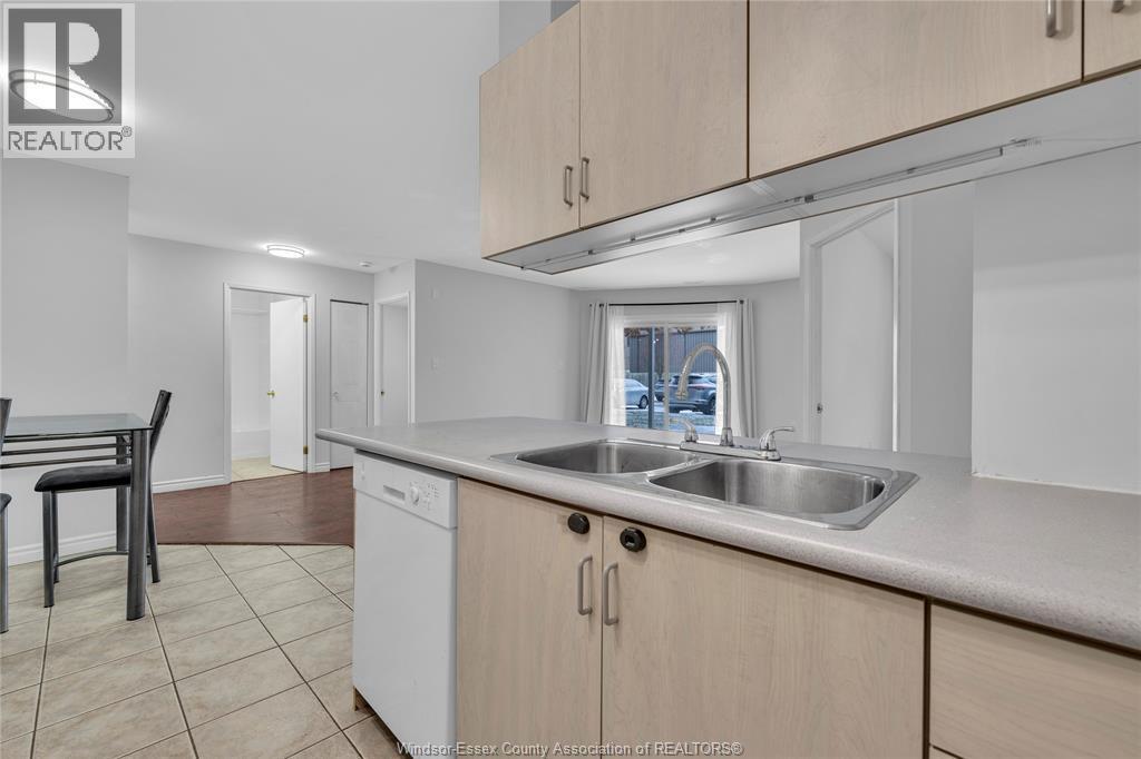 1390 Lauzon Road Unit# 114, Windsor, ON - Indoor Photo Showing Kitchen With Double Sink