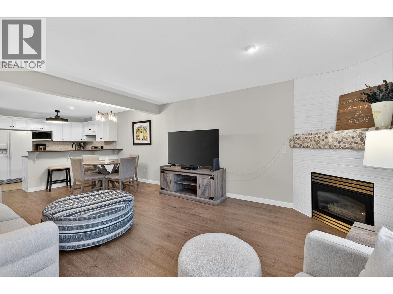 1002 Riverside Avenue Unit# 206, Sicamous, BC - Indoor Photo Showing Living Room With Fireplace