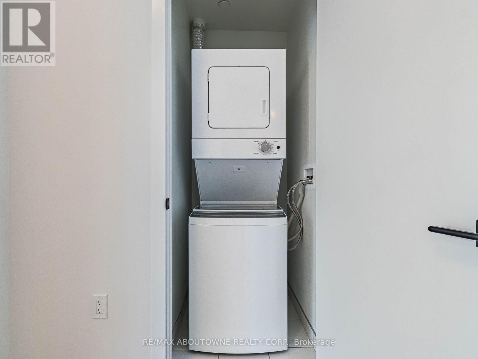 1912 - 10 Graphophone Grove, Toronto, ON - Indoor Photo Showing Laundry Room