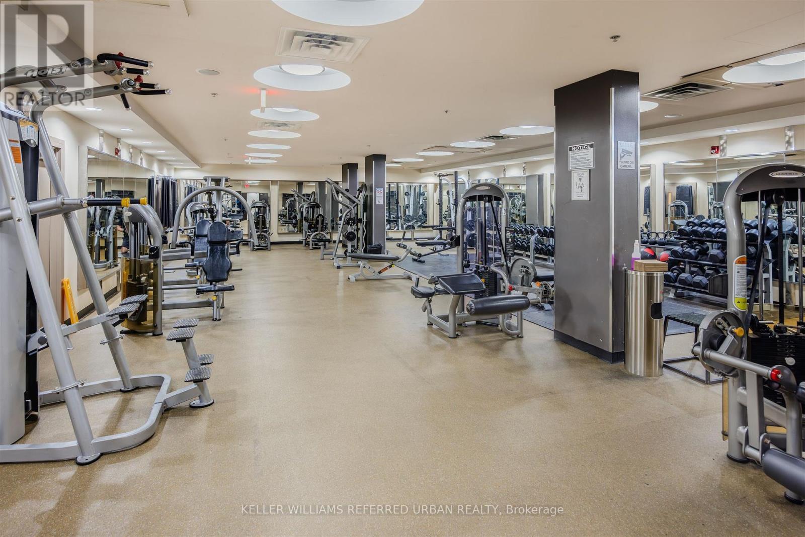 Th-115 - 90 Absolute Avenue, Mississauga, ON - Indoor Photo Showing Gym Room