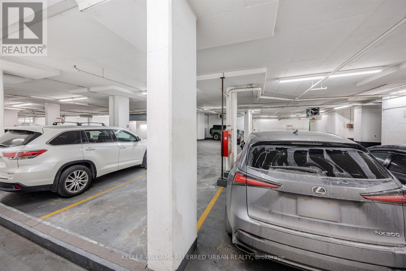 Th-115 - 90 Absolute Avenue, Mississauga, ON - Indoor Photo Showing Garage