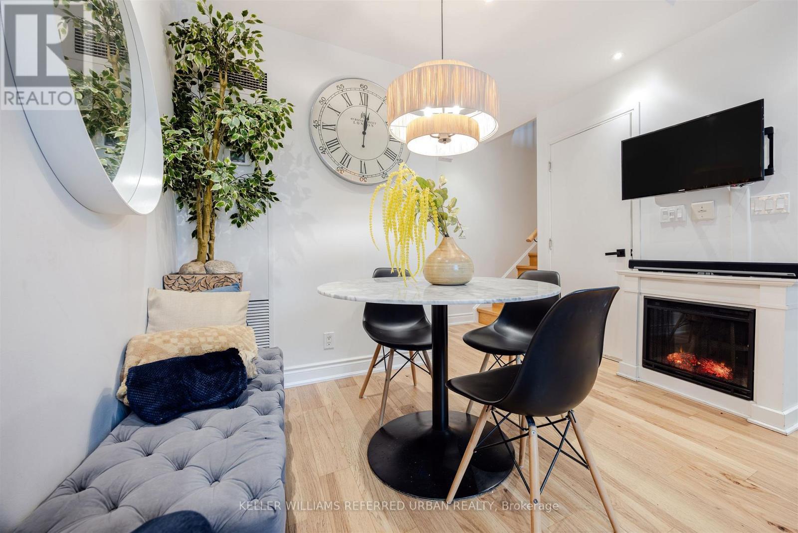 Th-115 - 90 Absolute Avenue, Mississauga, ON - Indoor Photo Showing Other Room With Fireplace