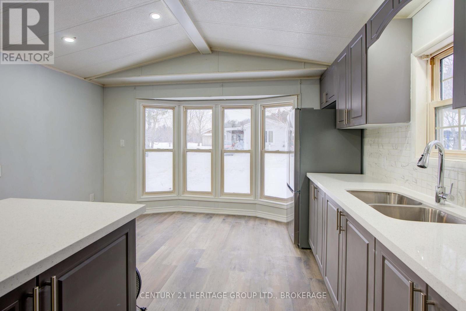 35 - 227 Big Hill Road, Leeds And The Thousand Islands, ON - Indoor Photo Showing Kitchen With Double Sink