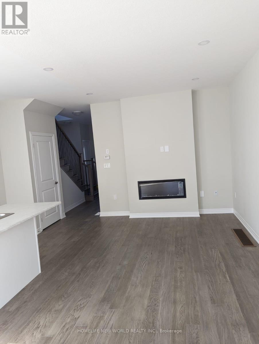 18 - 30 Mia Drive, Hamilton, ON - Indoor With Fireplace