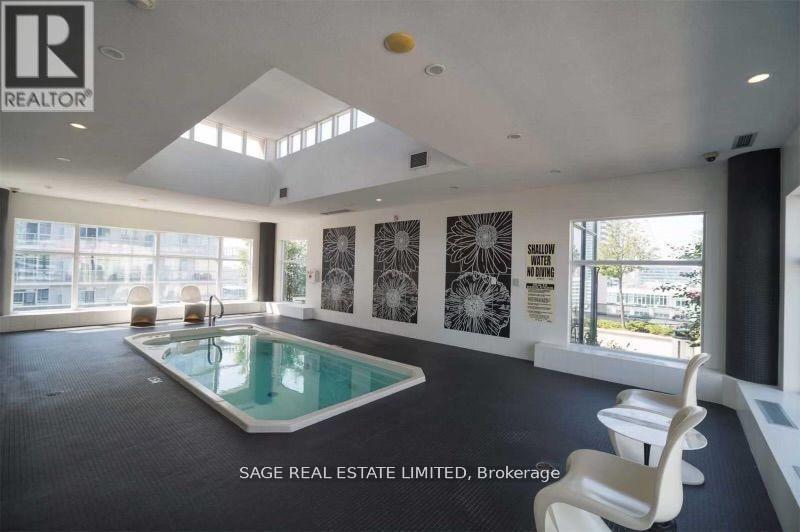 202 - 20 Blue Jays Way, Toronto, ON - Indoor Photo Showing Other Room With In Ground Pool