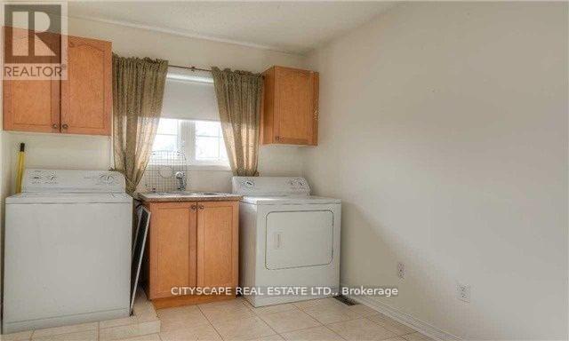Upper - 5227 Tresca Trail, Mississauga, ON - Indoor Photo Showing Laundry Room